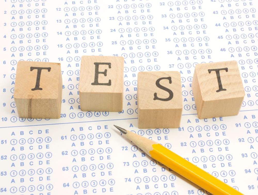 Spelling test block with letters for a test